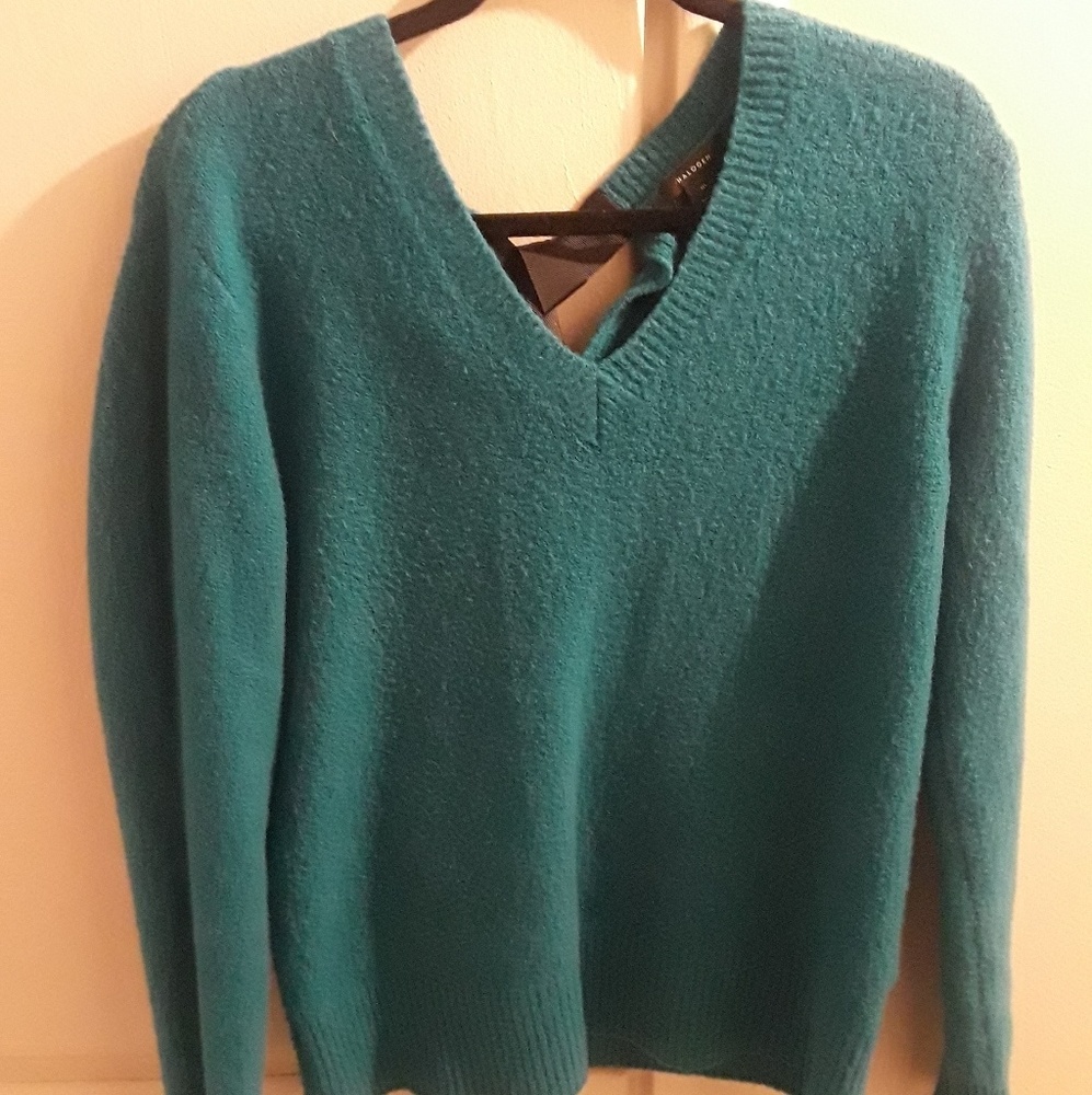 Women's sweater with black ribbon tie in the back